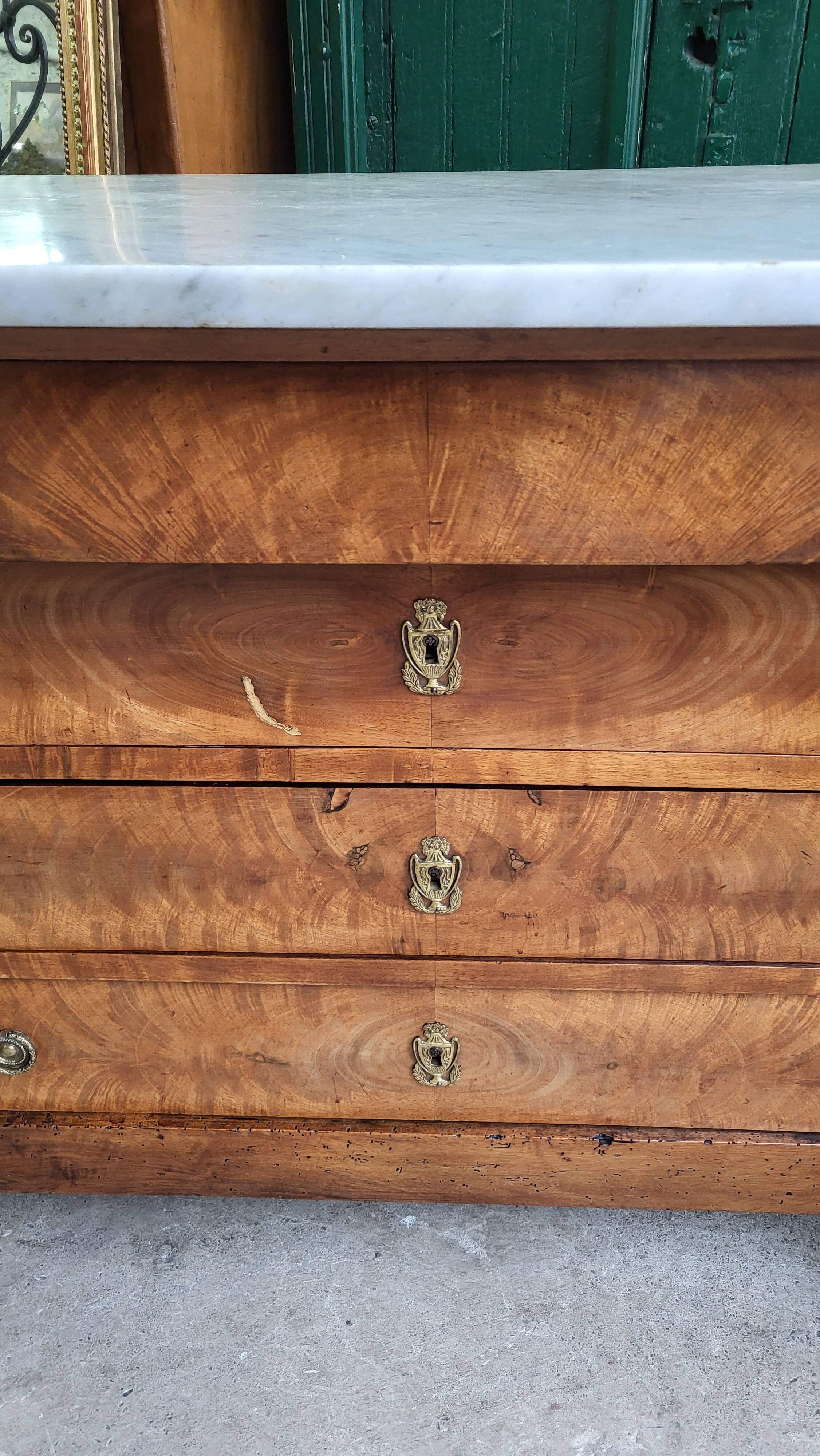 Empire commode in walnut with white marble top from the 19th century