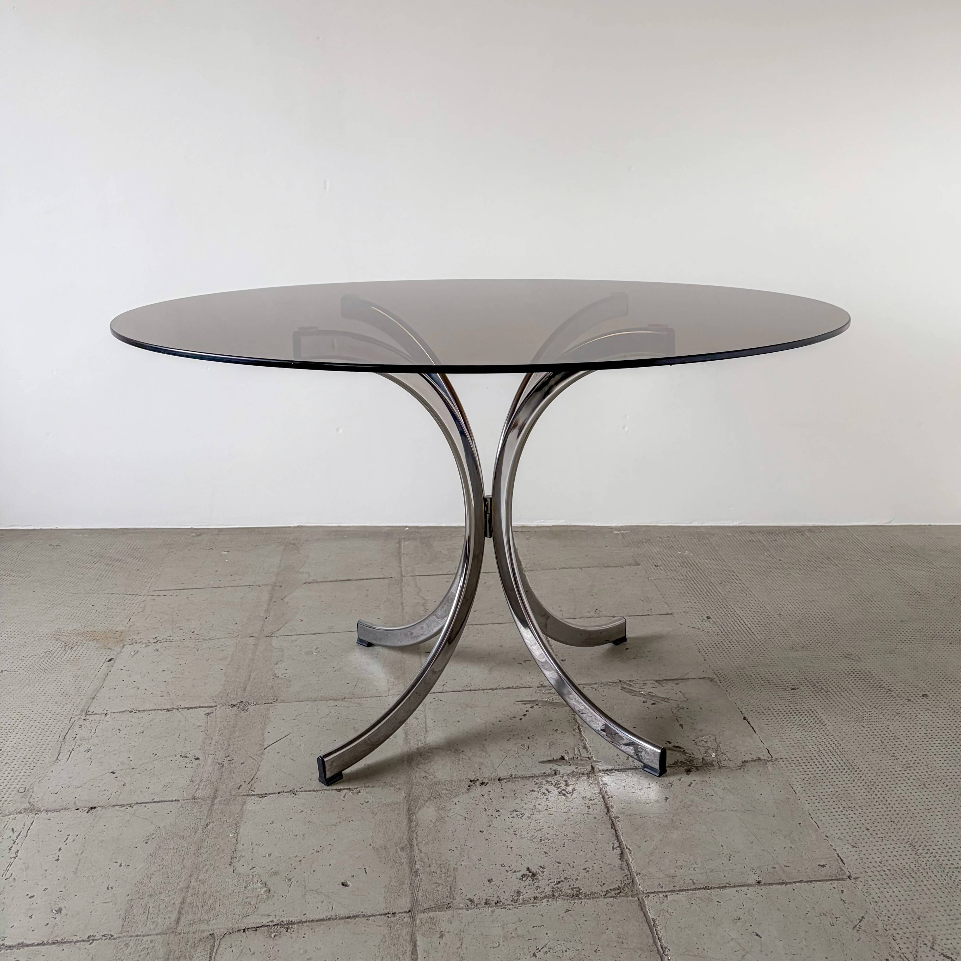 1970s Italian dining table in smoked glass and chrome.