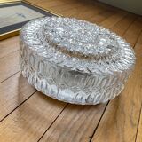 Large wall-mounted ceiling light with transparent glass.