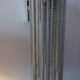 Swarovski wall lamp in silver-plated metal with crystal pendants.
