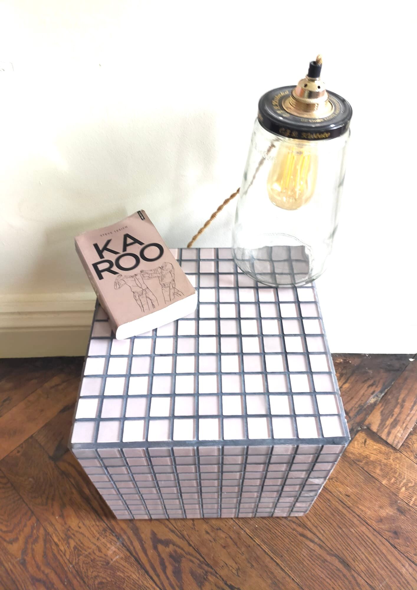 Ceramic tile cube, stool end of sofa