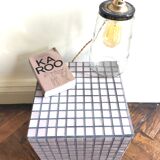 Ceramic tile cube, stool end of sofa