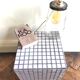Ceramic tile cube, stool end of sofa