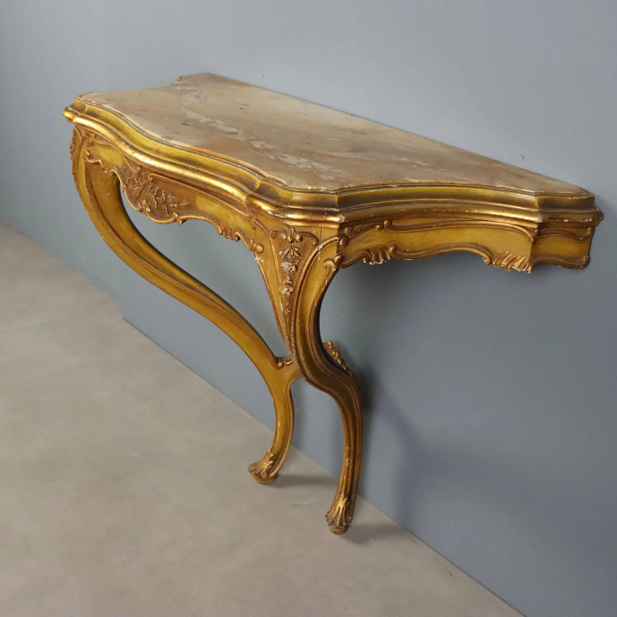 Antique console in carved gilded wood and marble, Italy, 19th century.