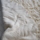 Vintage ecru natural wool round rug