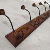 Wall mounted coat rack