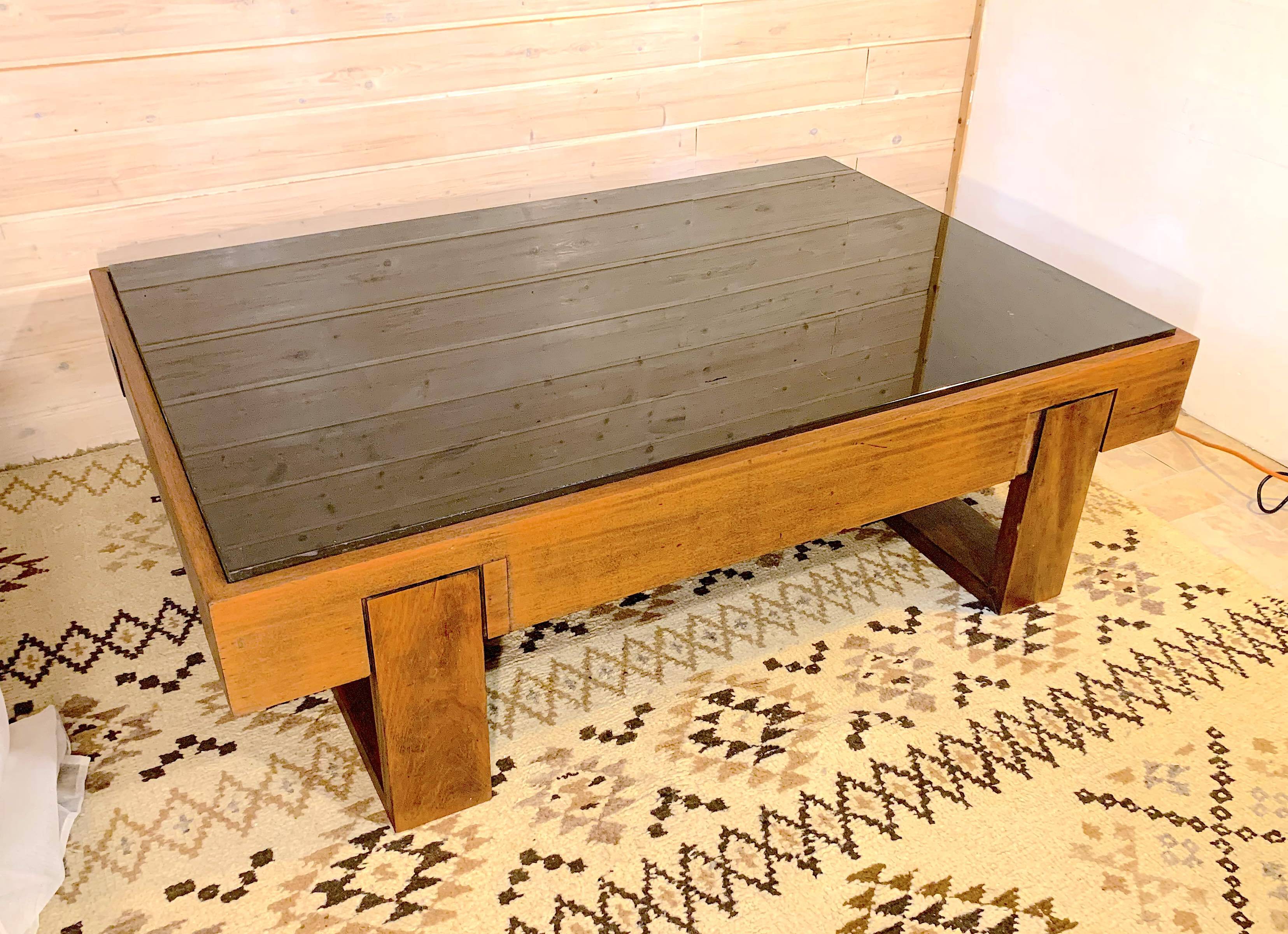 Rosewood coffee table, with black glass top, Brazil 1970