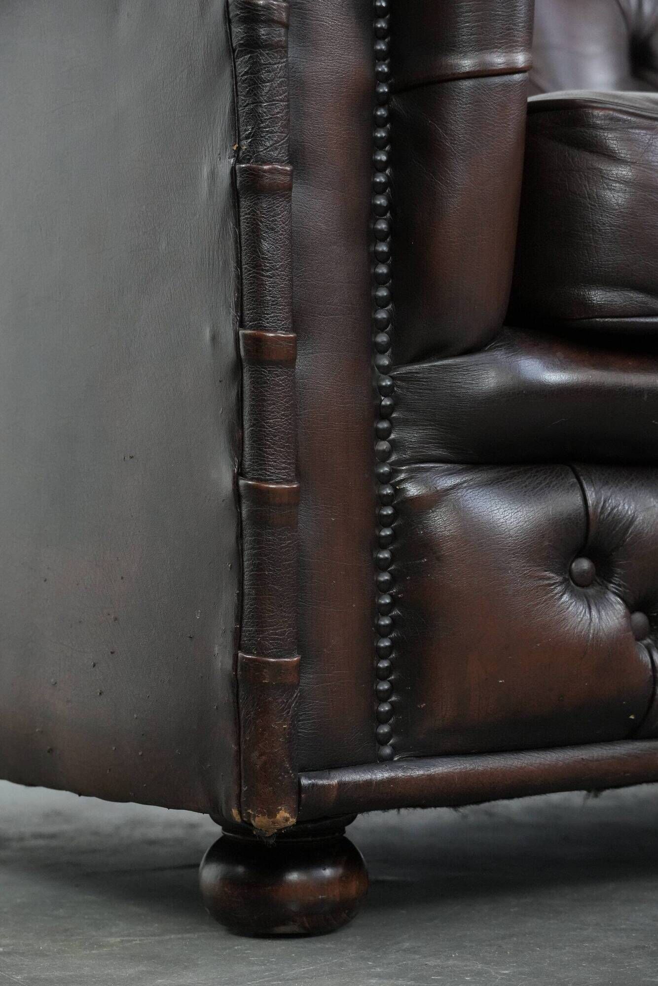 Dark brown cow leather vintage 2-seater Chesterfield sofa in English style