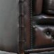 Dark brown cow leather vintage 2-seater Chesterfield sofa in English style