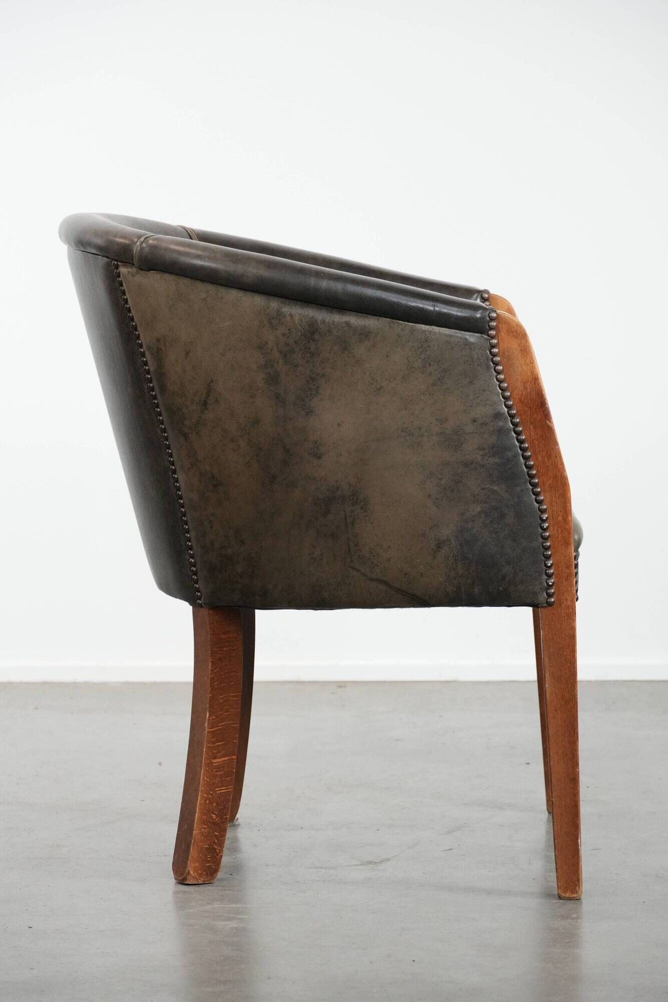 Amazing cow leather and wooden tub chair / side chair