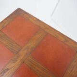 Vintage wooden side table with terracotta top