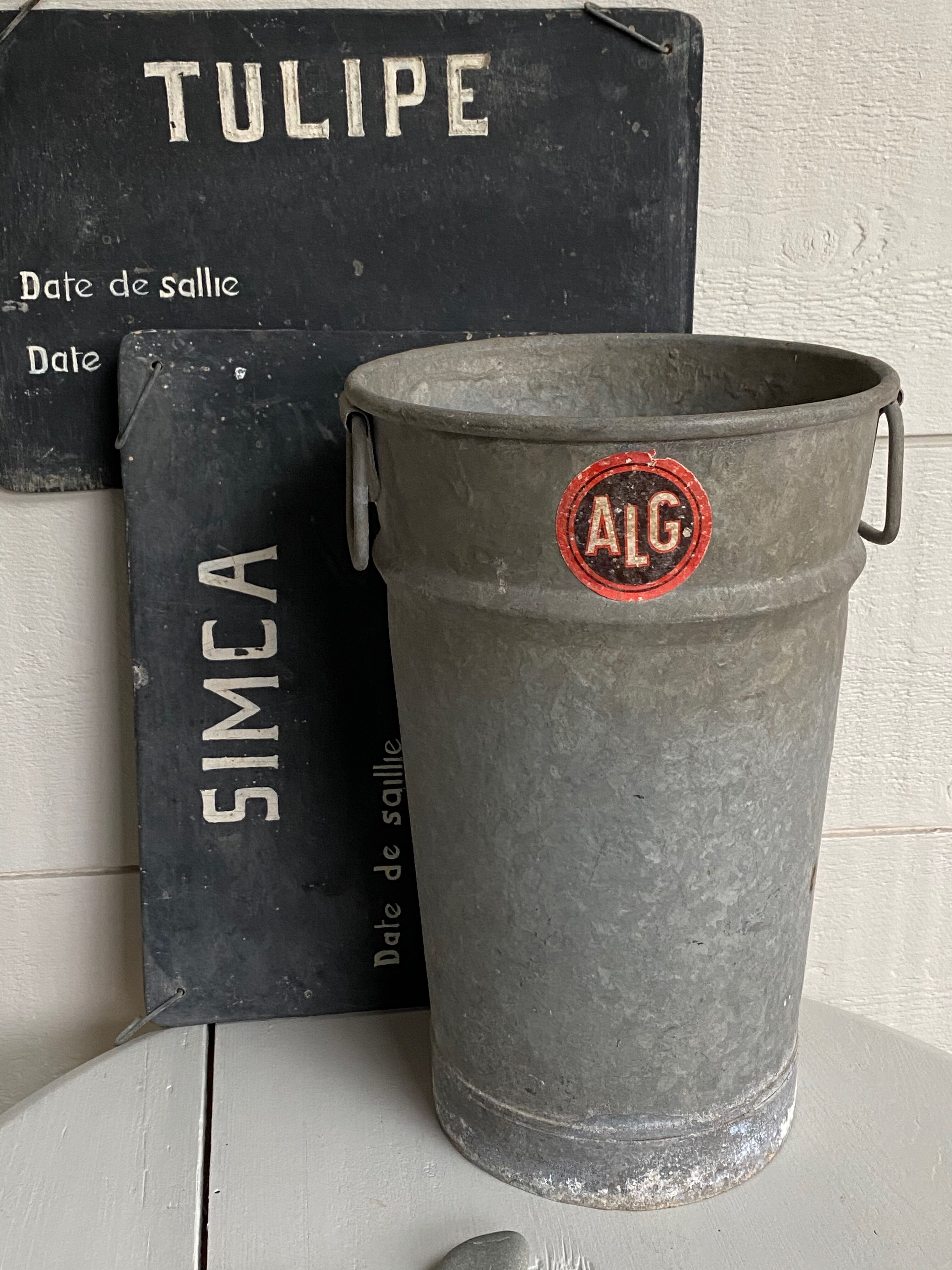 Old zinc florist vase