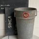 Old zinc florist vase