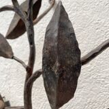Wall lamp in wrought iron.