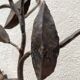 Wall lamp in wrought iron.