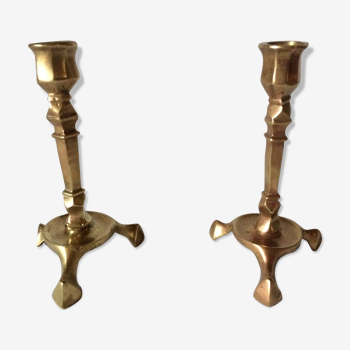 Old candlesticks in gilded bronze