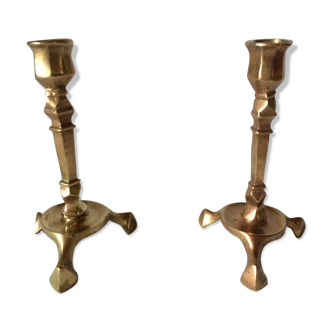 Old candlesticks in gilded bronze