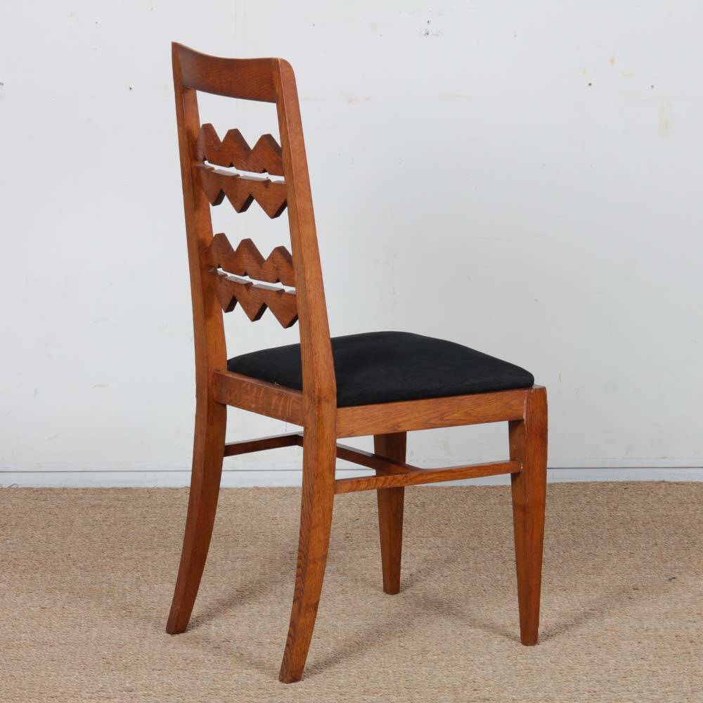 Solid oak chair, French craftsmanship from the 1950s.