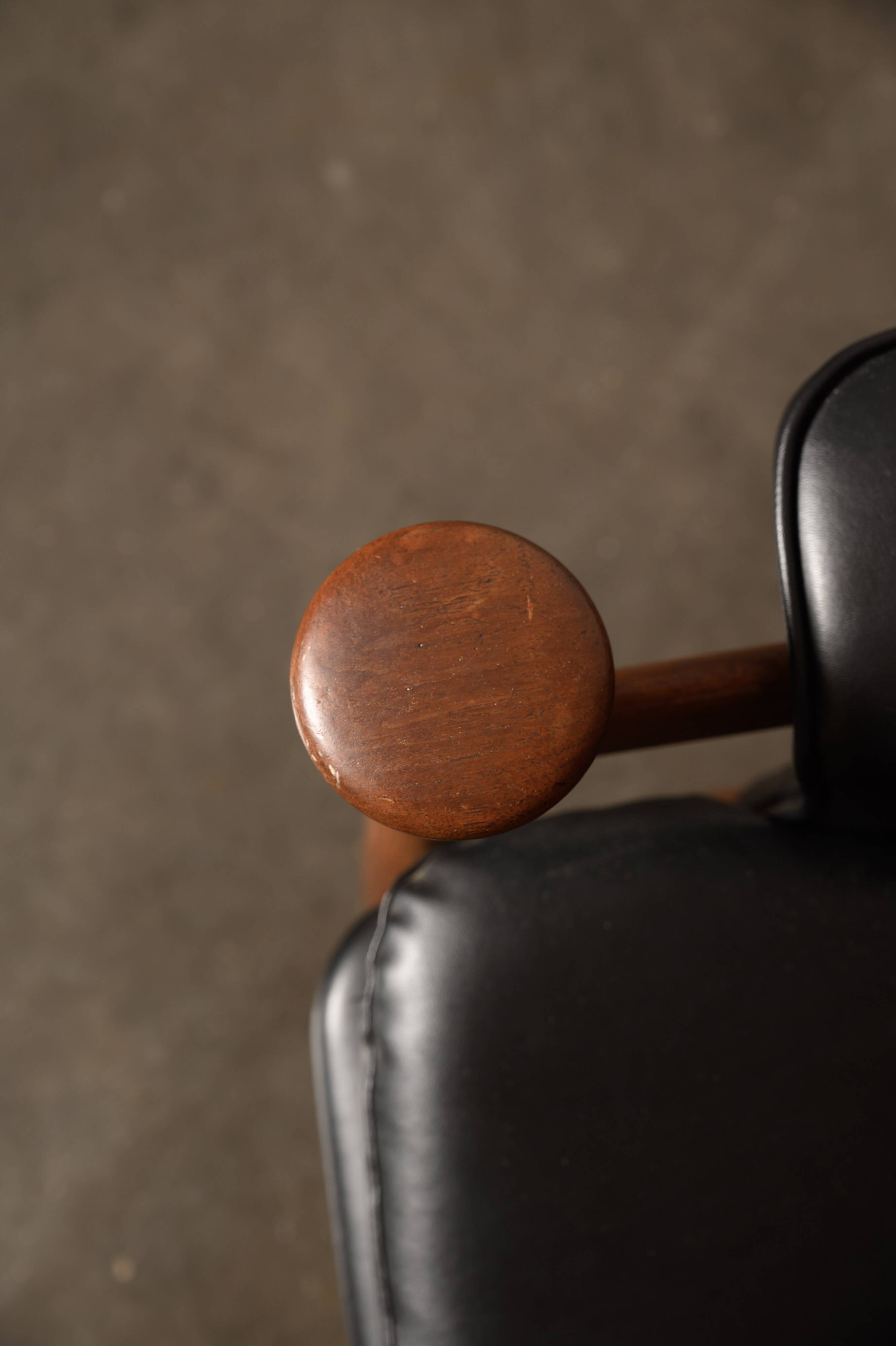 Finished Juhl armchair and its ottoman.