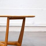 Oval teak coffee table