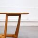 Oval teak coffee table