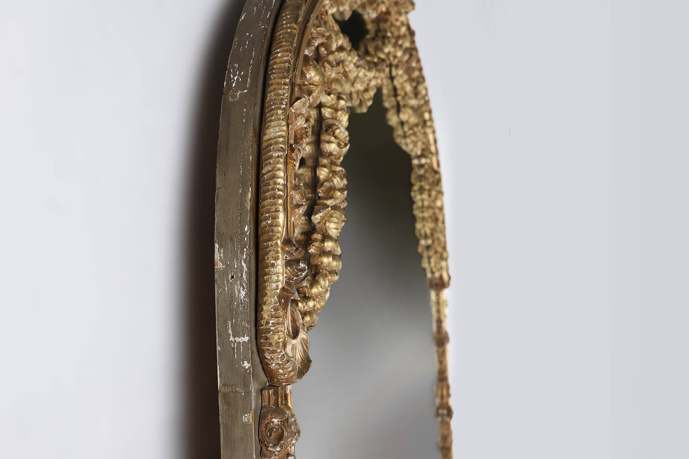 Large baroque decorated chimney mirror in gilted wood, France ca. 1800