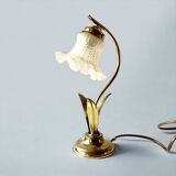 Old brass accent lamp in the shape of a flower