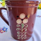 Enamelled clay pitcher