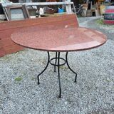 Round marble table with wrought iron base from the mid-20th century.
