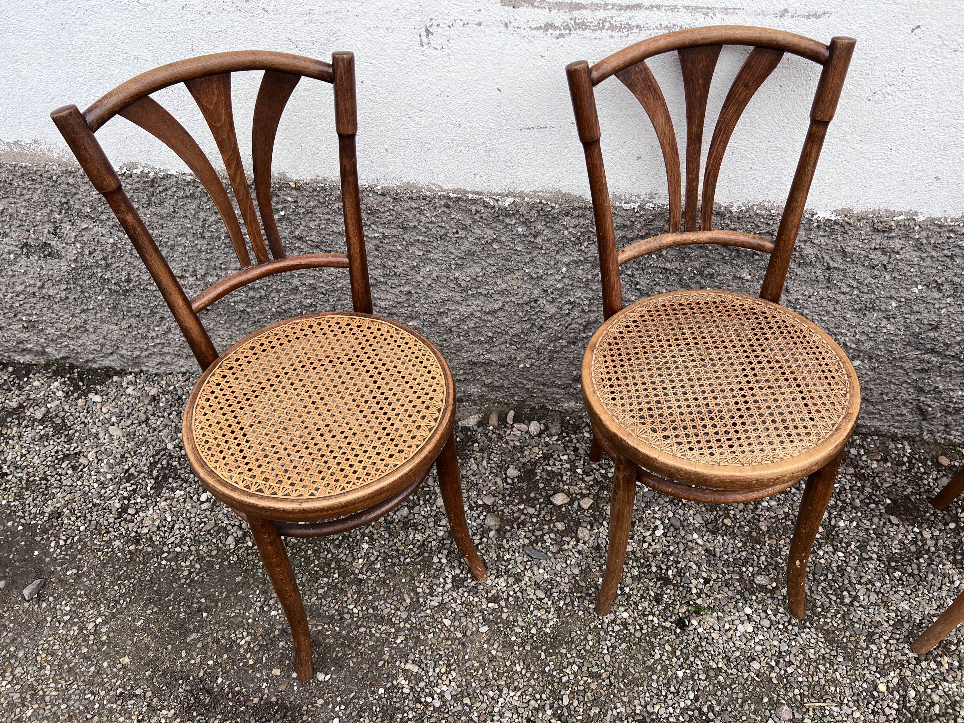 Series of 4 wooden chairs and cannage