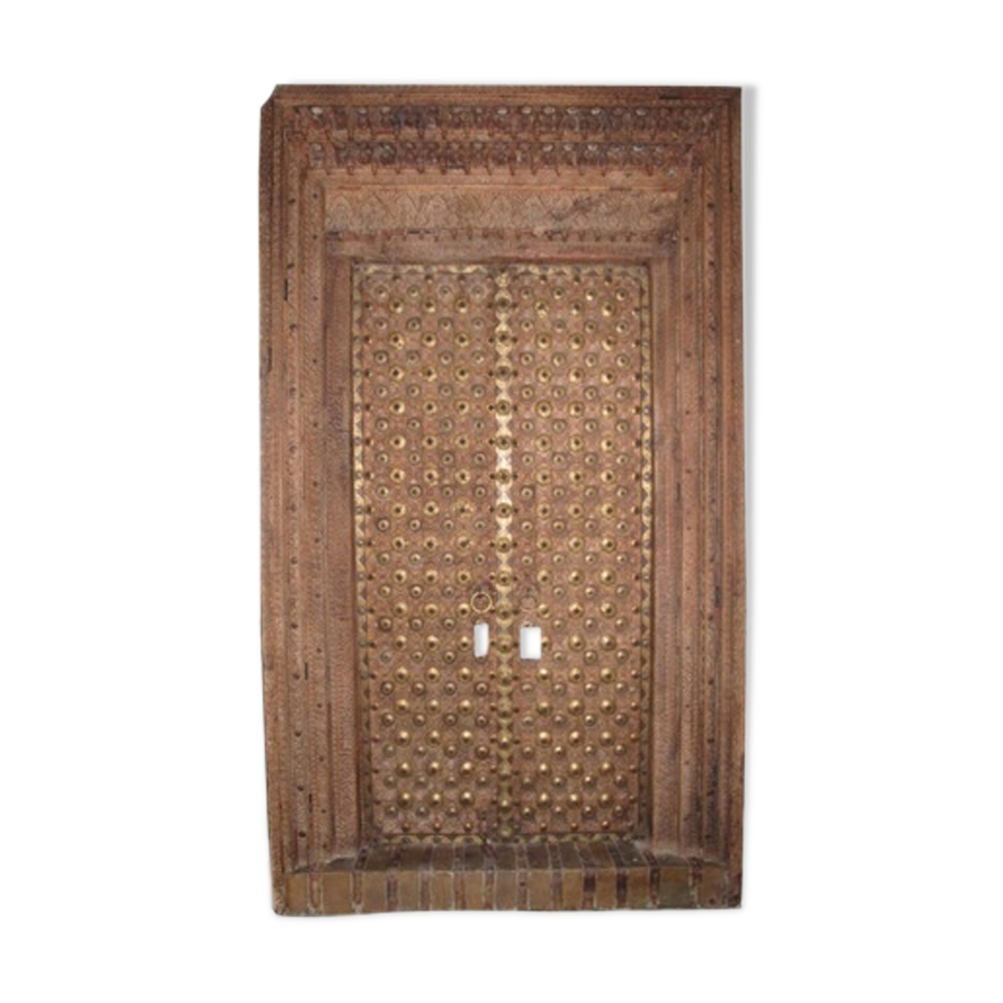 Old crafted teak and brass door