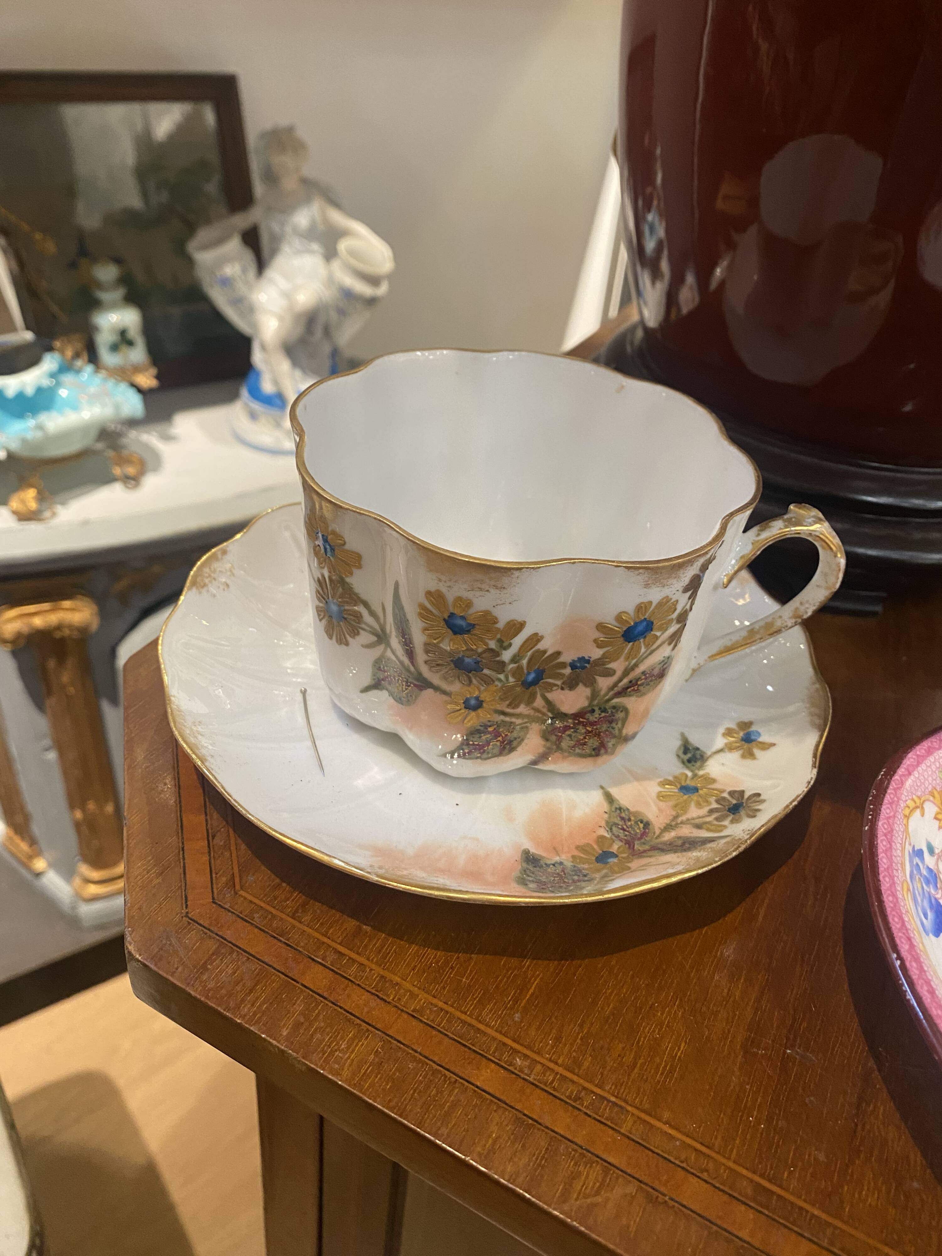 Enameled porcelain cup with saucer