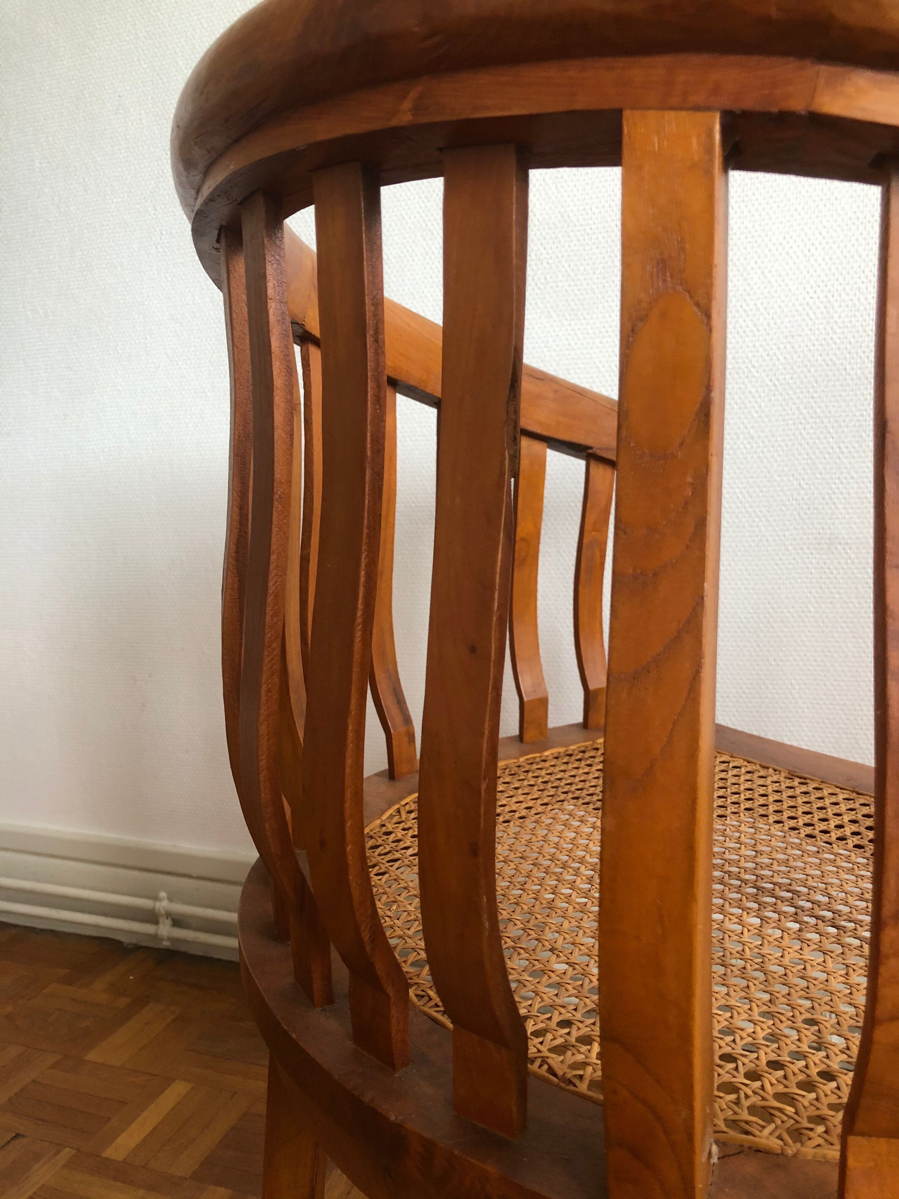 Exotic wooden canne colonial armchair