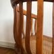 Fauteuil colonial canné en bois exotique