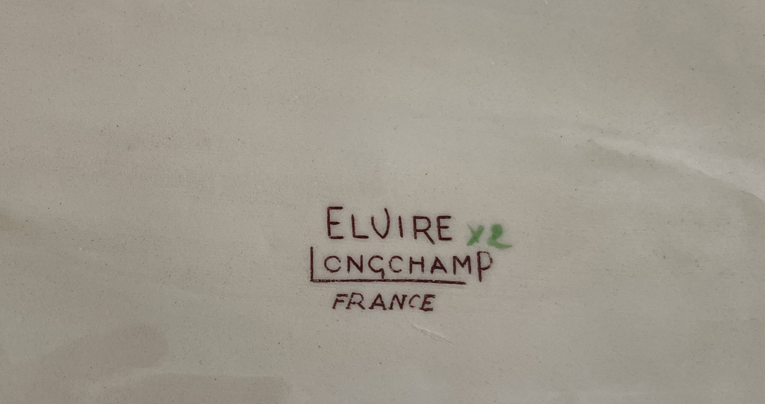 Antique serving dish in Longchamp earthenware.