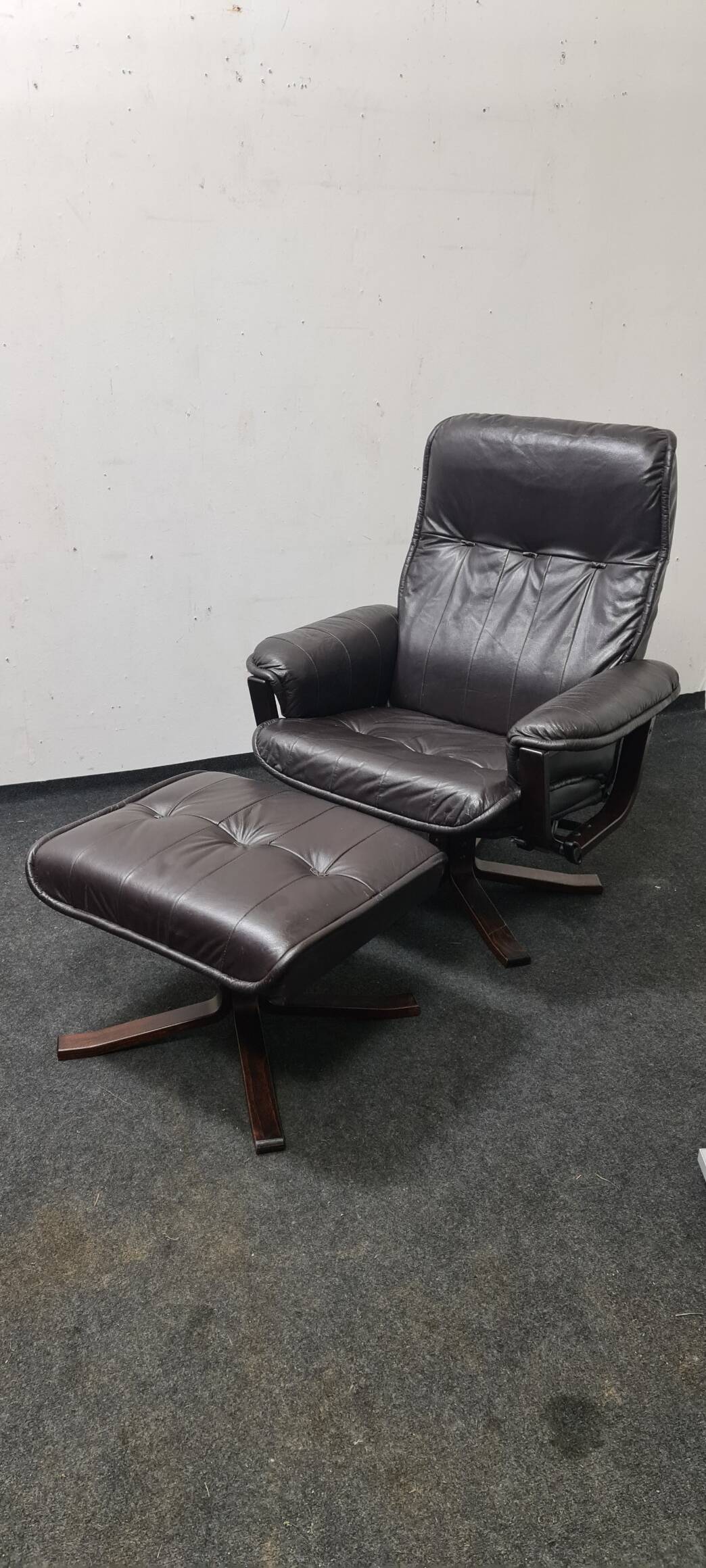 Vintage leather reclining swivel chair with foot stool