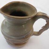 Enamelled ceramic pitcher, ass signature to be identified