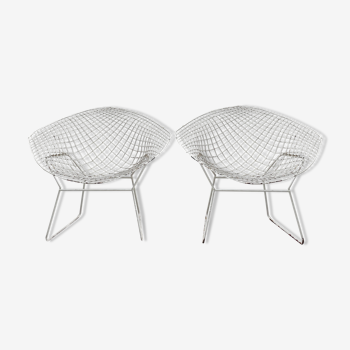 Pair of armchairs in white patinated mesh metal.