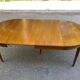 Round extendable dining table Louis XVI in cherry wood from the 1960s.