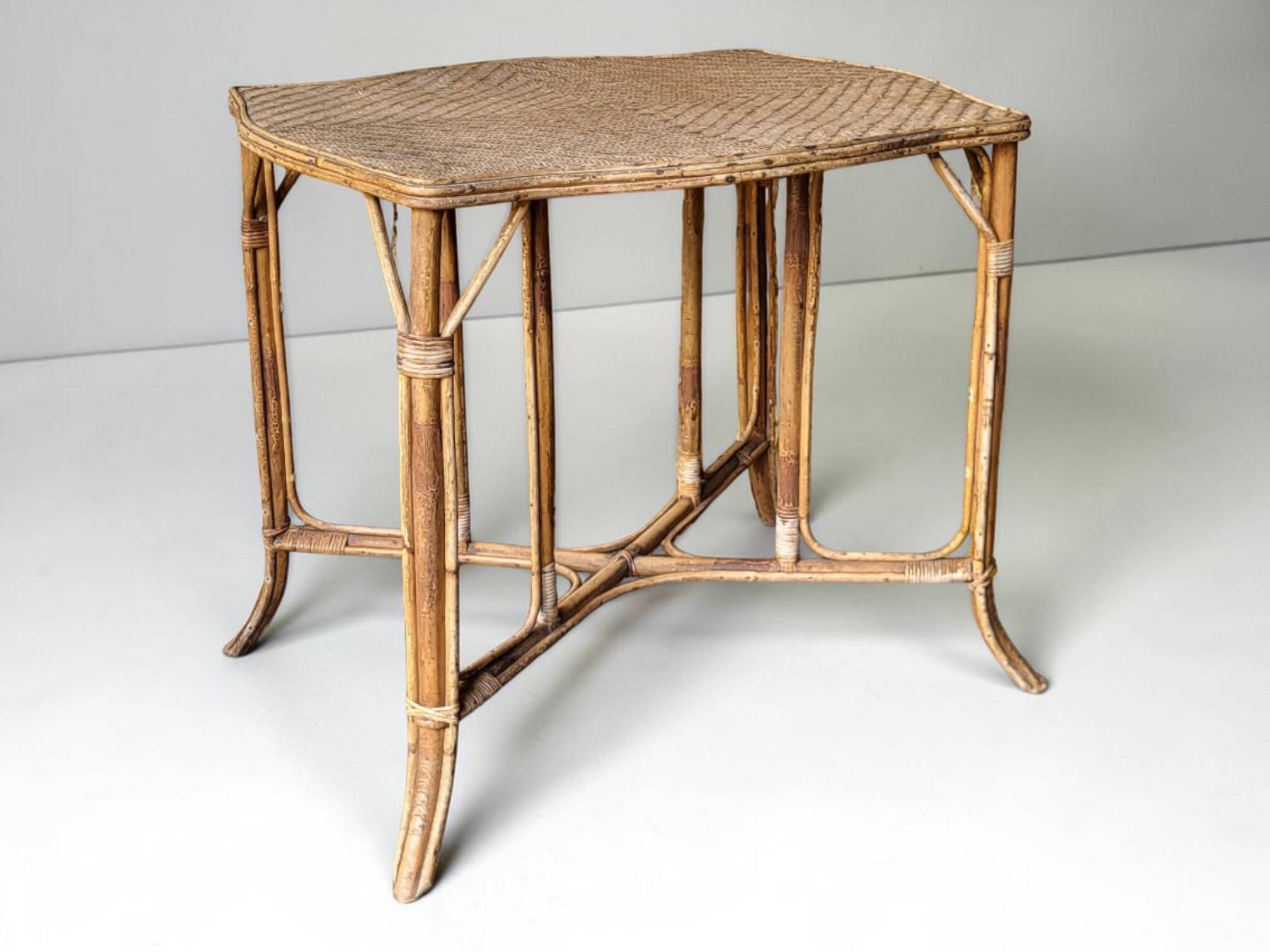 Natural rattan table, circa 1960-1970