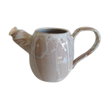 White terracotta pourer