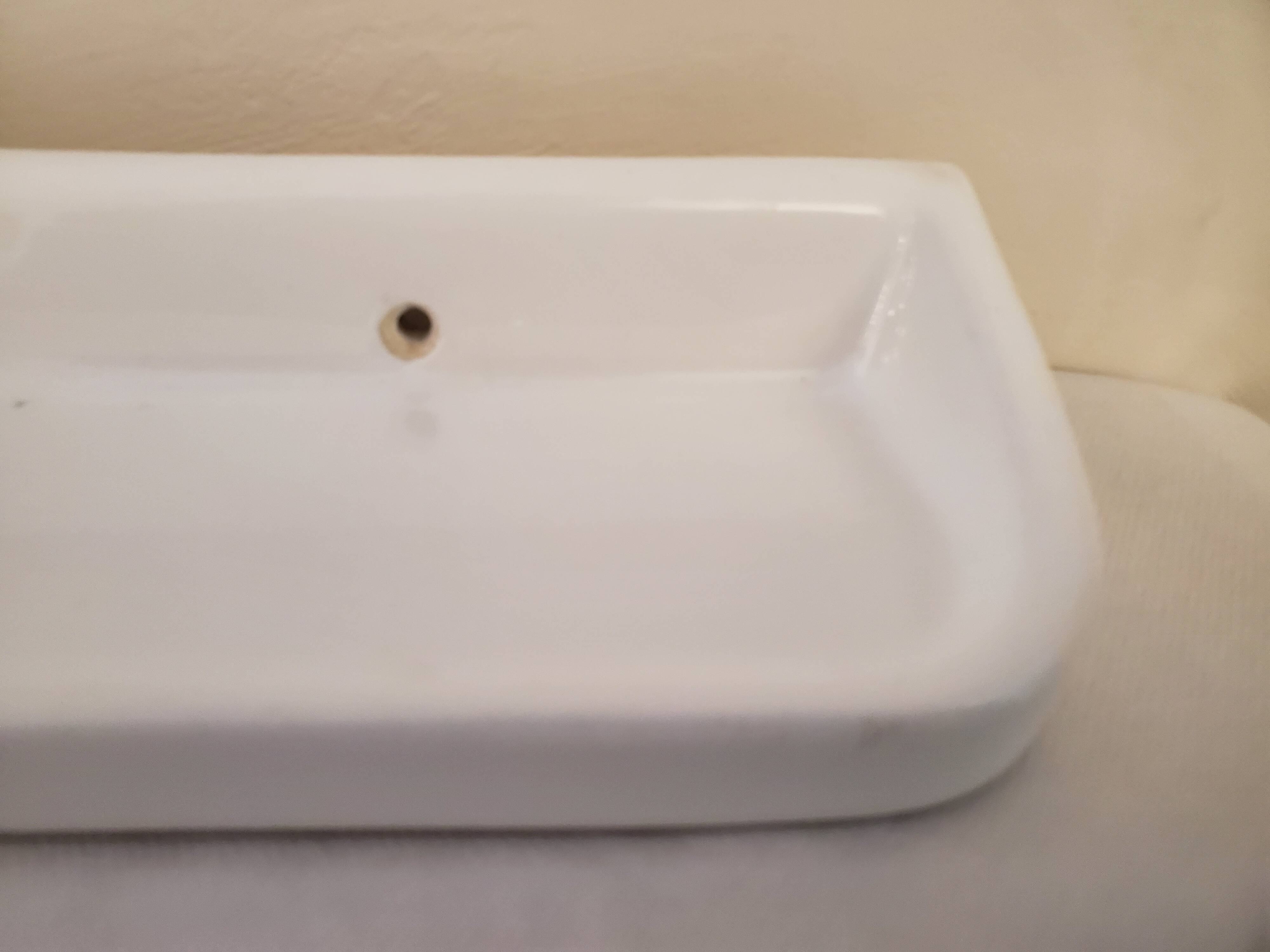 White ceramic bathroom shelf