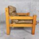 Vintage heater armchair in pine and leather 70s