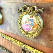 An antique French Louis XVI-style marble-top side cabinet