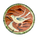 Decorative cut dish in terracotta
