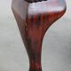 In very good condition elegant red/brown chesterfield ottoman made of cow leather