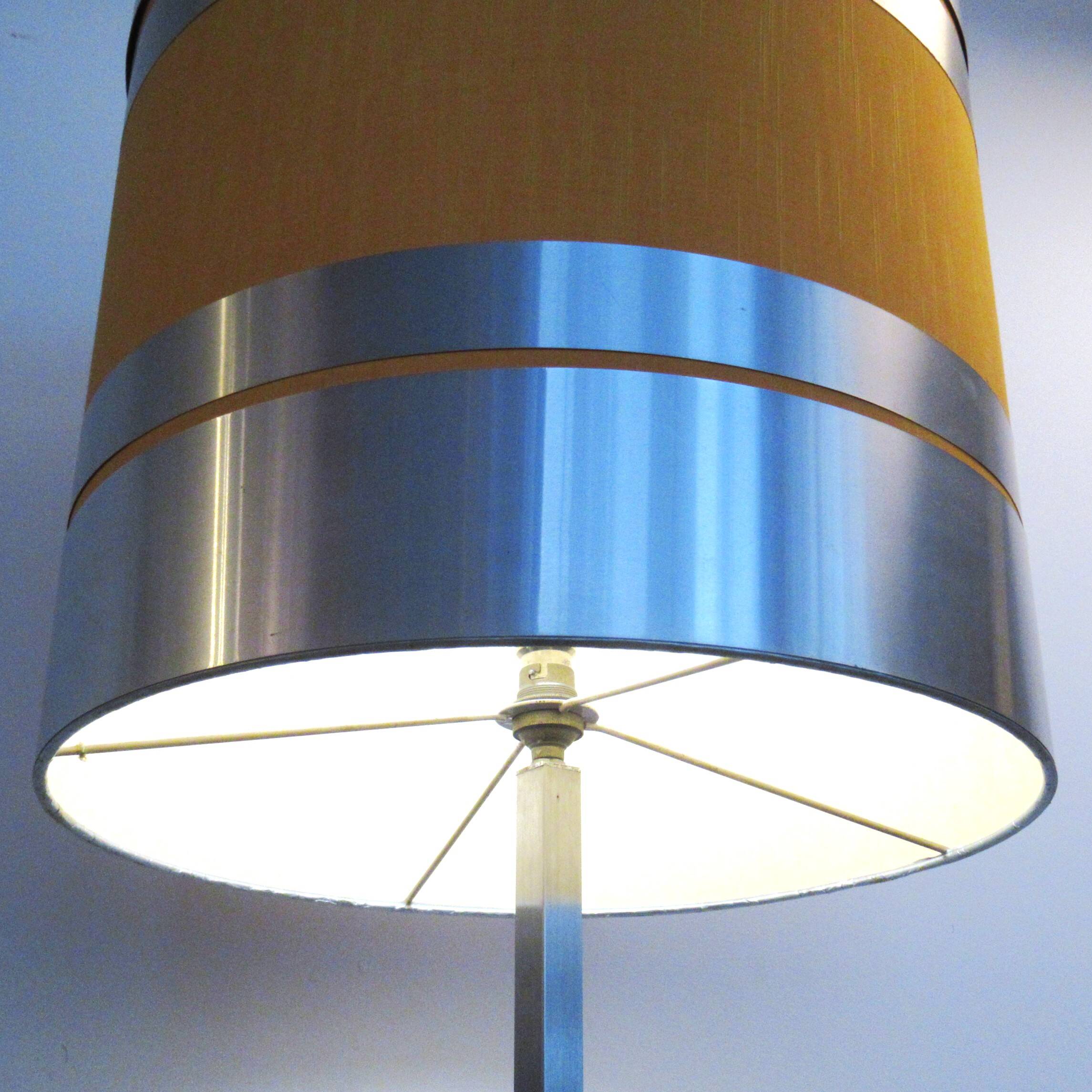 Floor lamp with a large orange shade and metal from the 1960s.