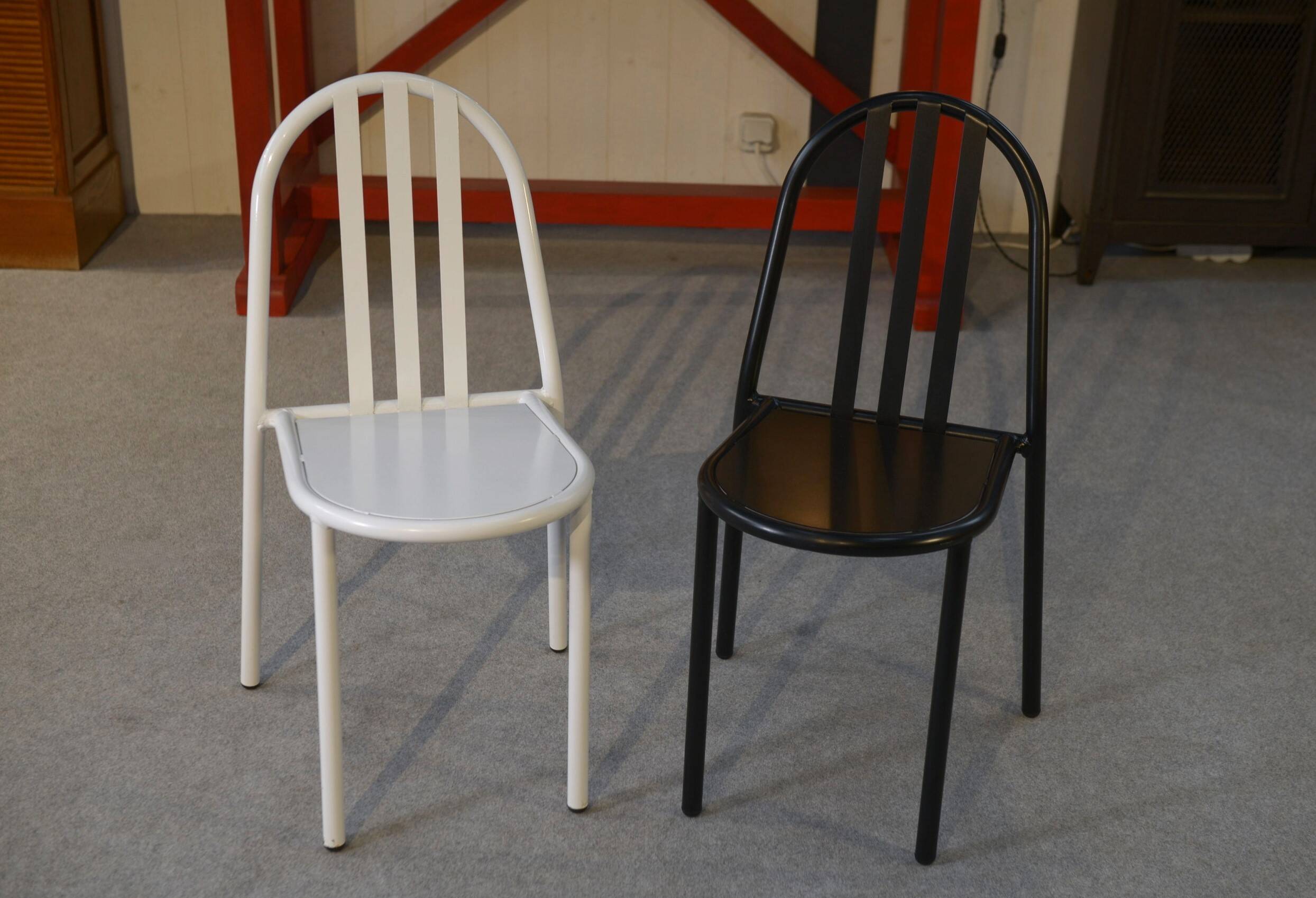 Pair of white and black chairs by Mallet Stevens