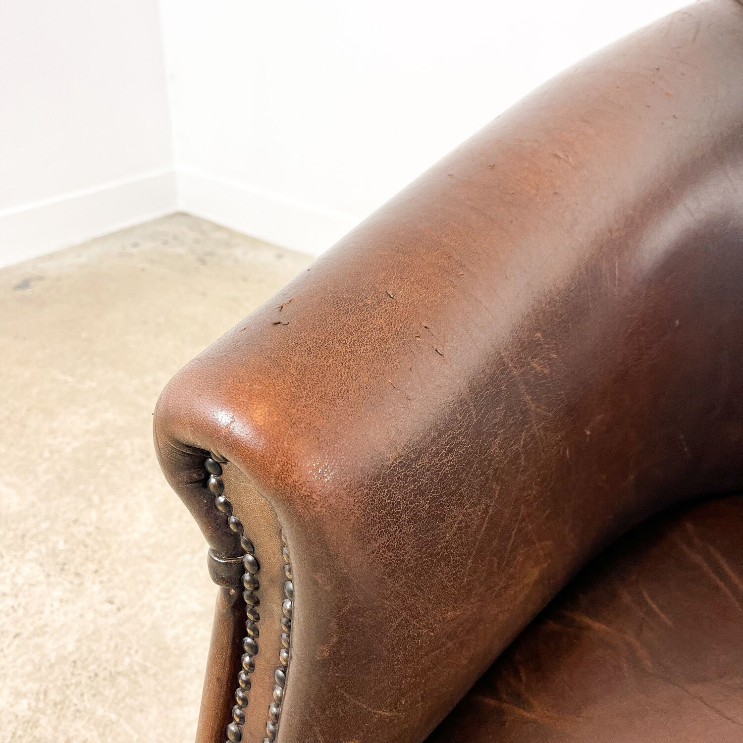 Vintage dark brown sheep leather clubchair rijsbergen