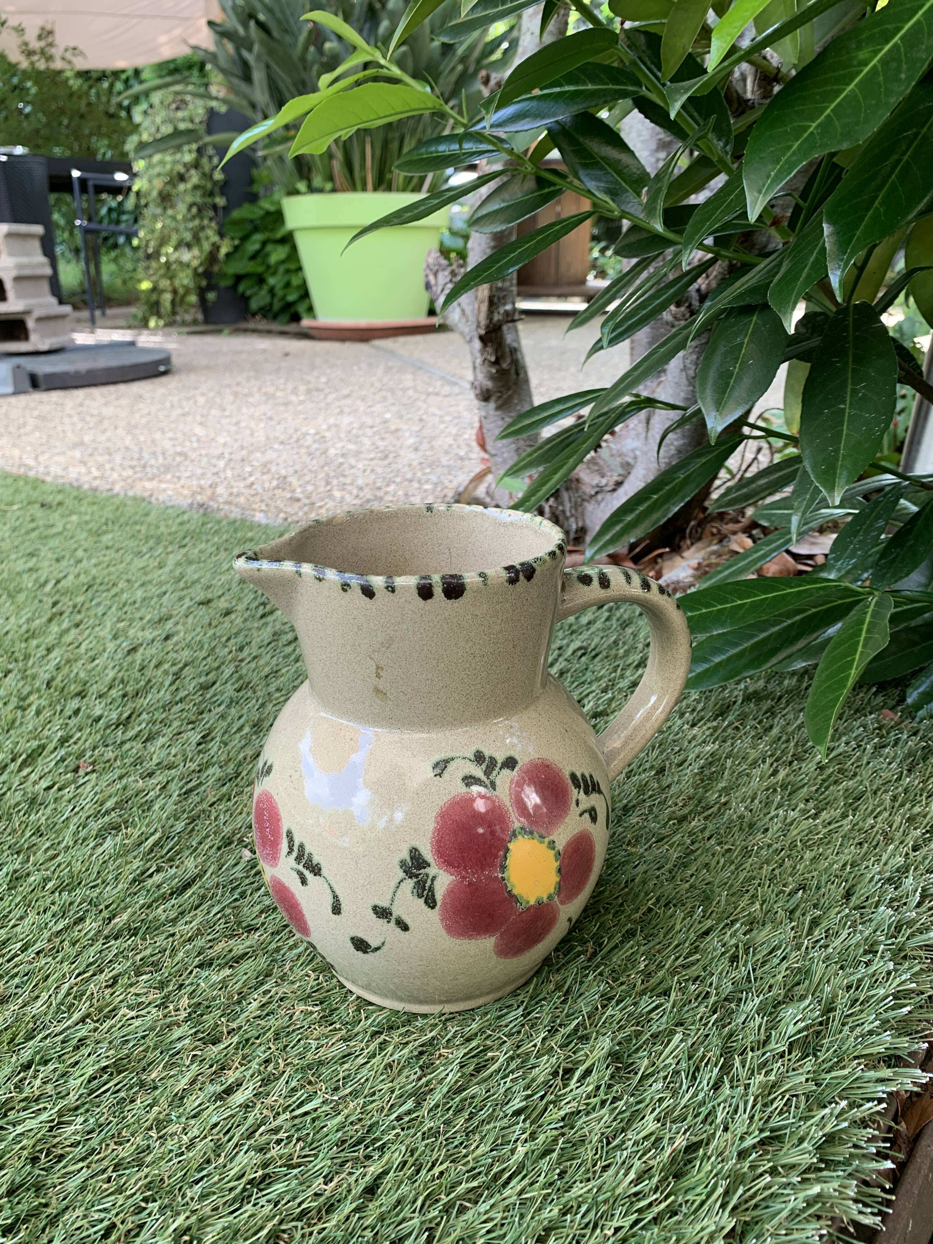 Vintage ceramic pitcher model flowers